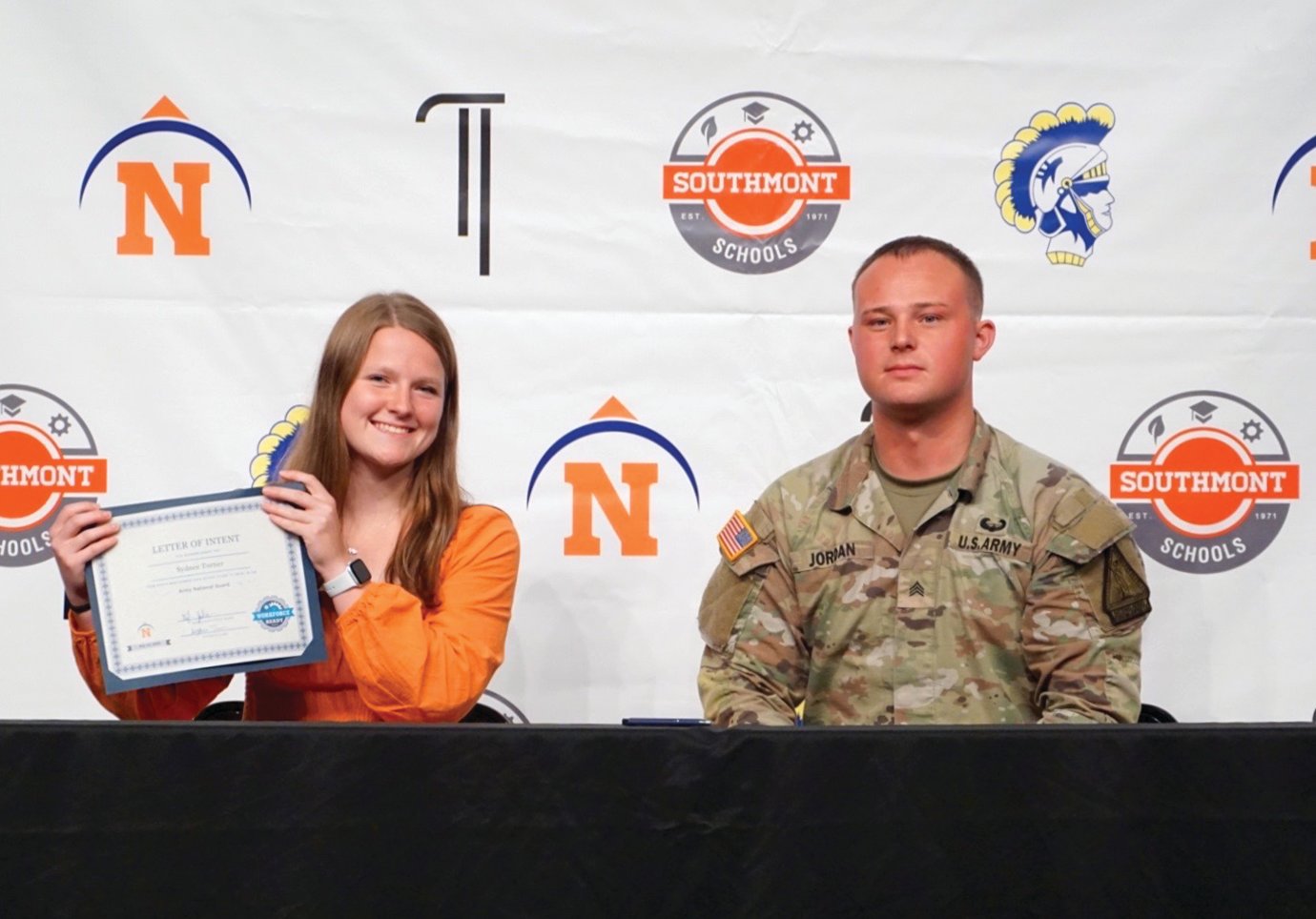 Sydnee Turner commits to the U.S. Army National Guard Tuesday at the Workforce Signing ceremony at North Montgomery High School alongside Sgt. Tyler Jordan.